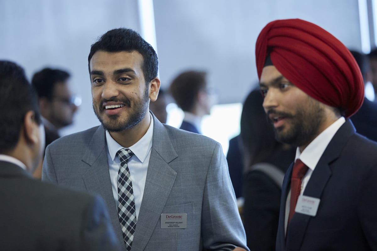 Students in discussion at event