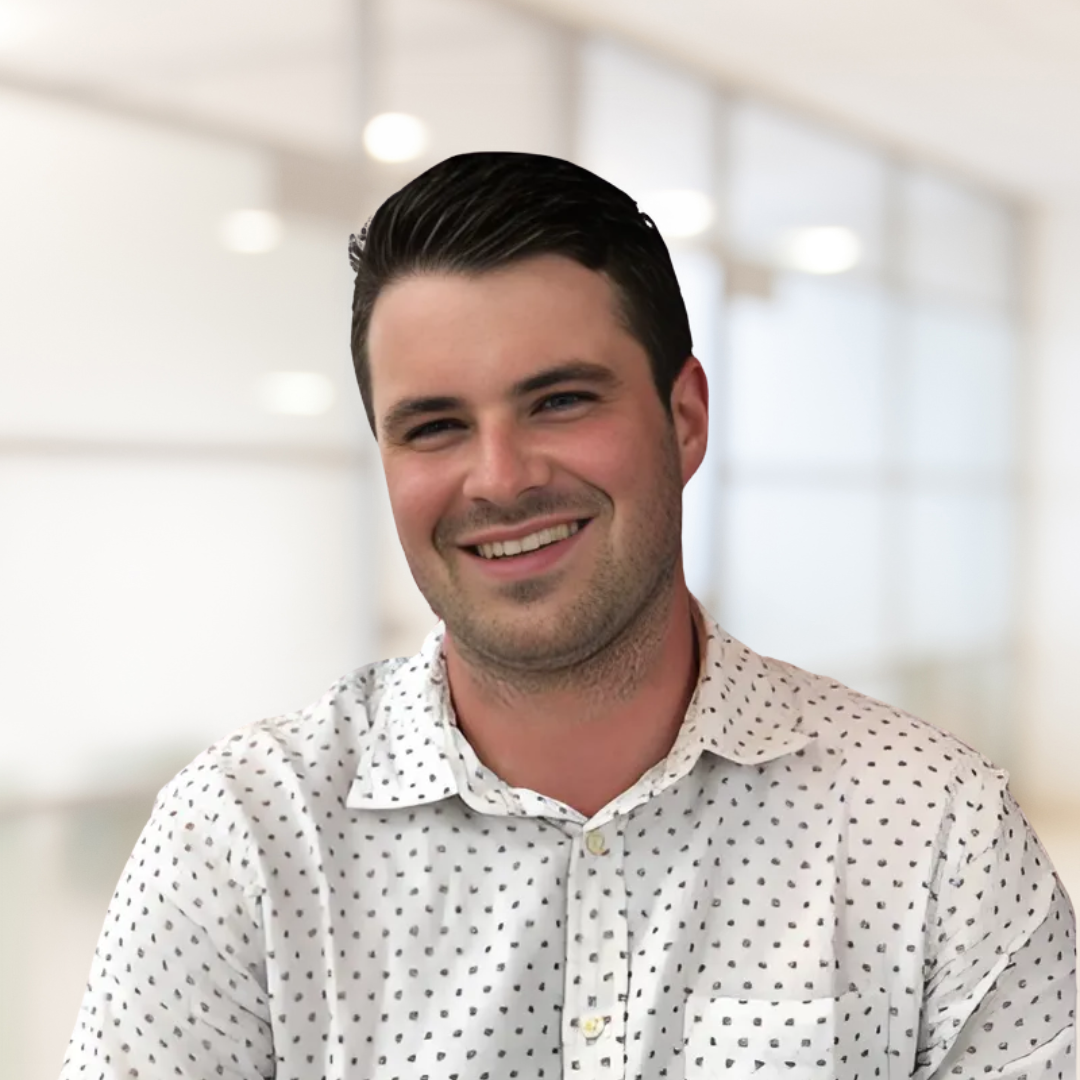 Headshot of Joel MacPherson, smiling.